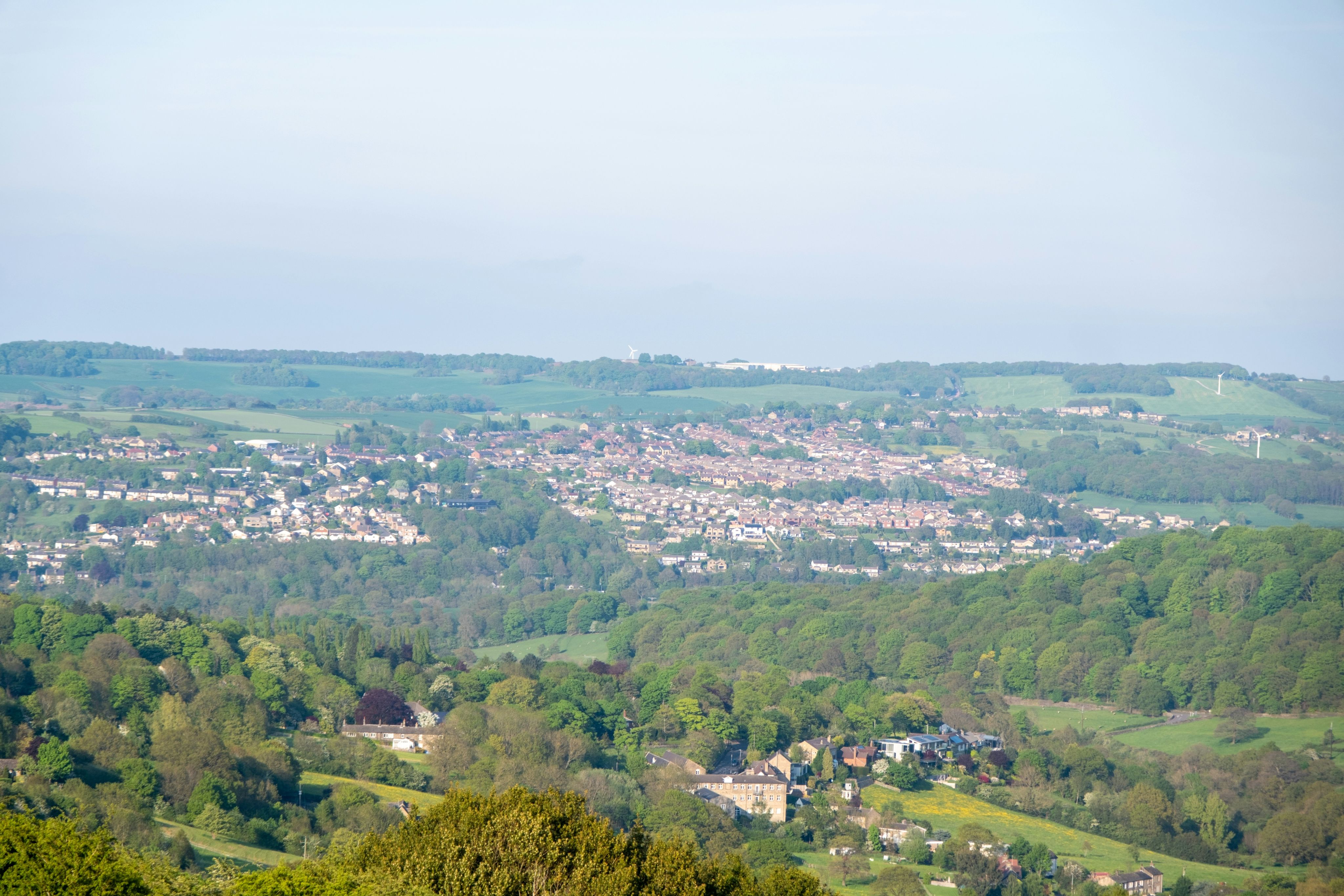 a view of a city from a hill