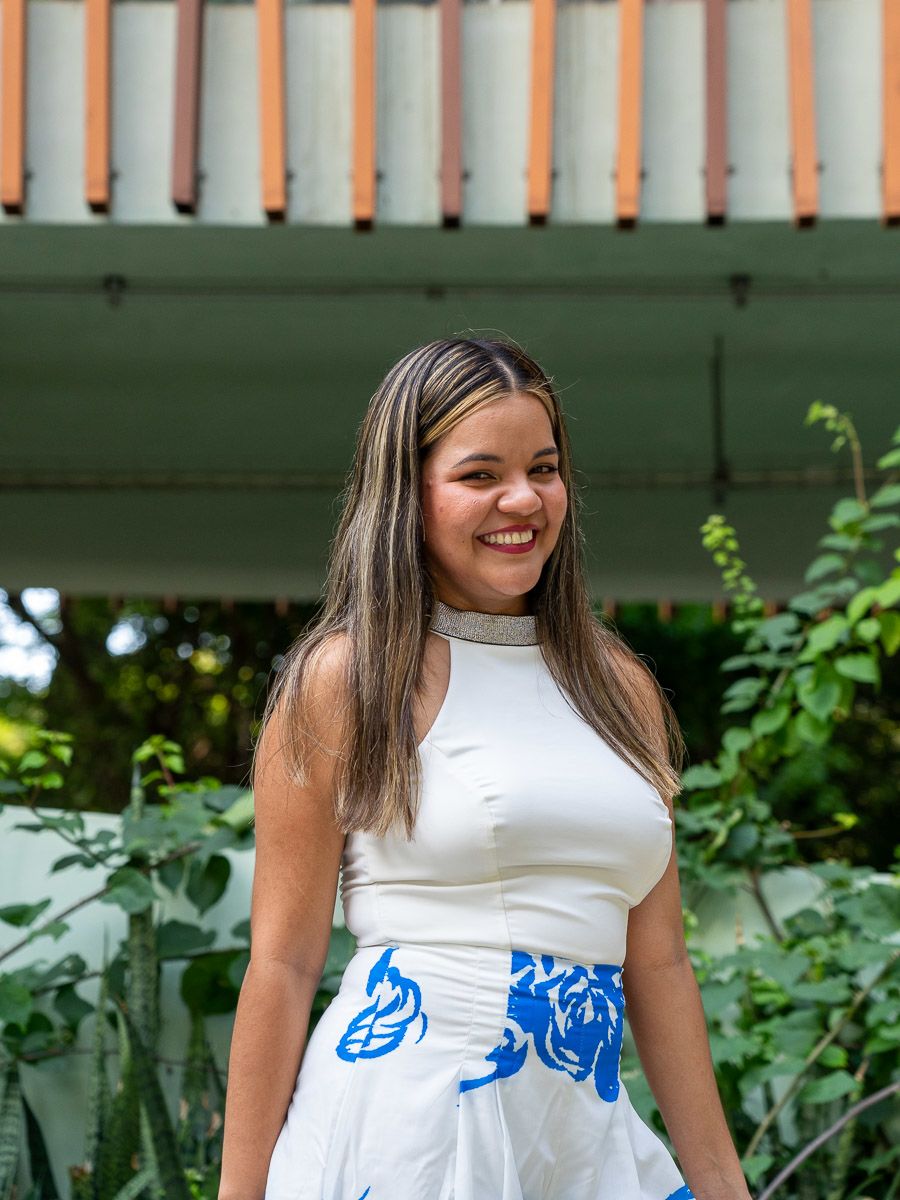 A young woman poses for a portrait. 